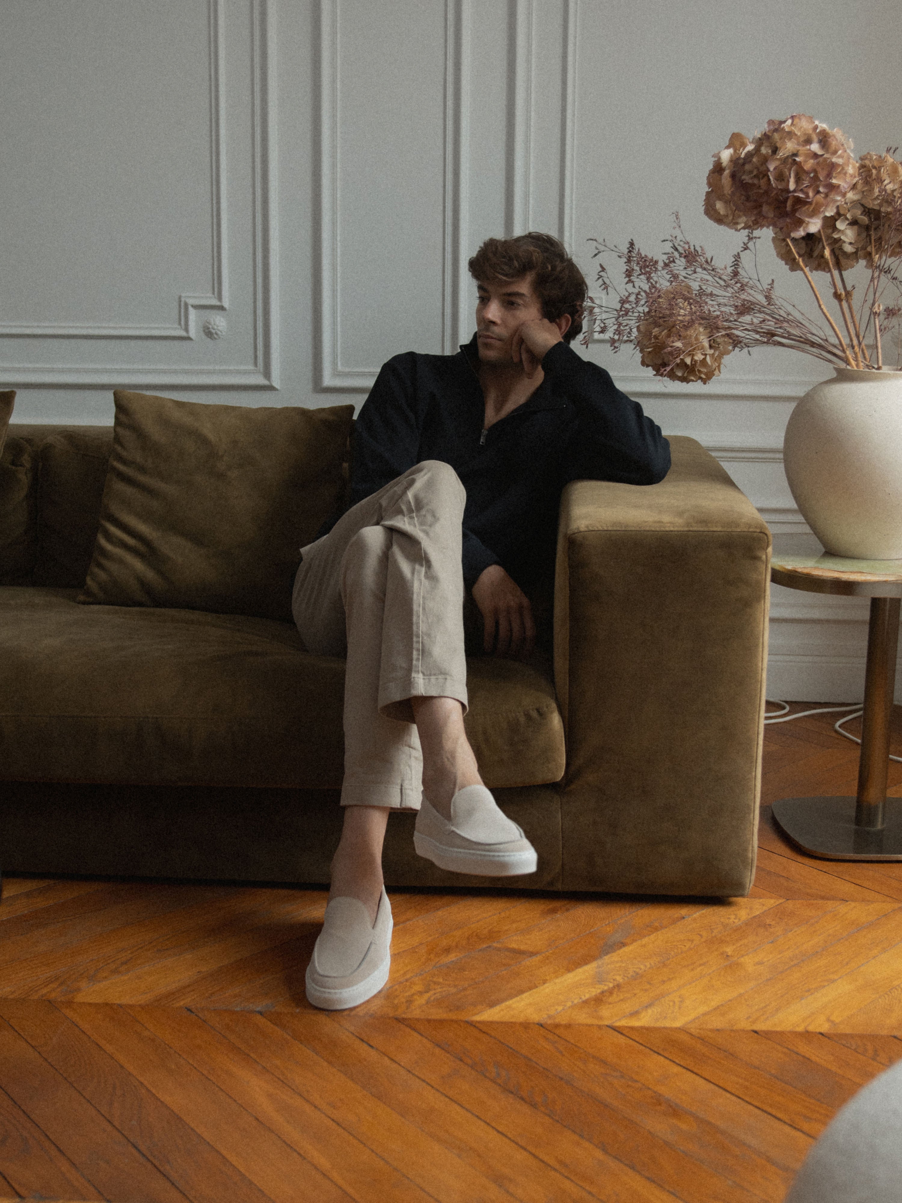 Man sitting wearing Men