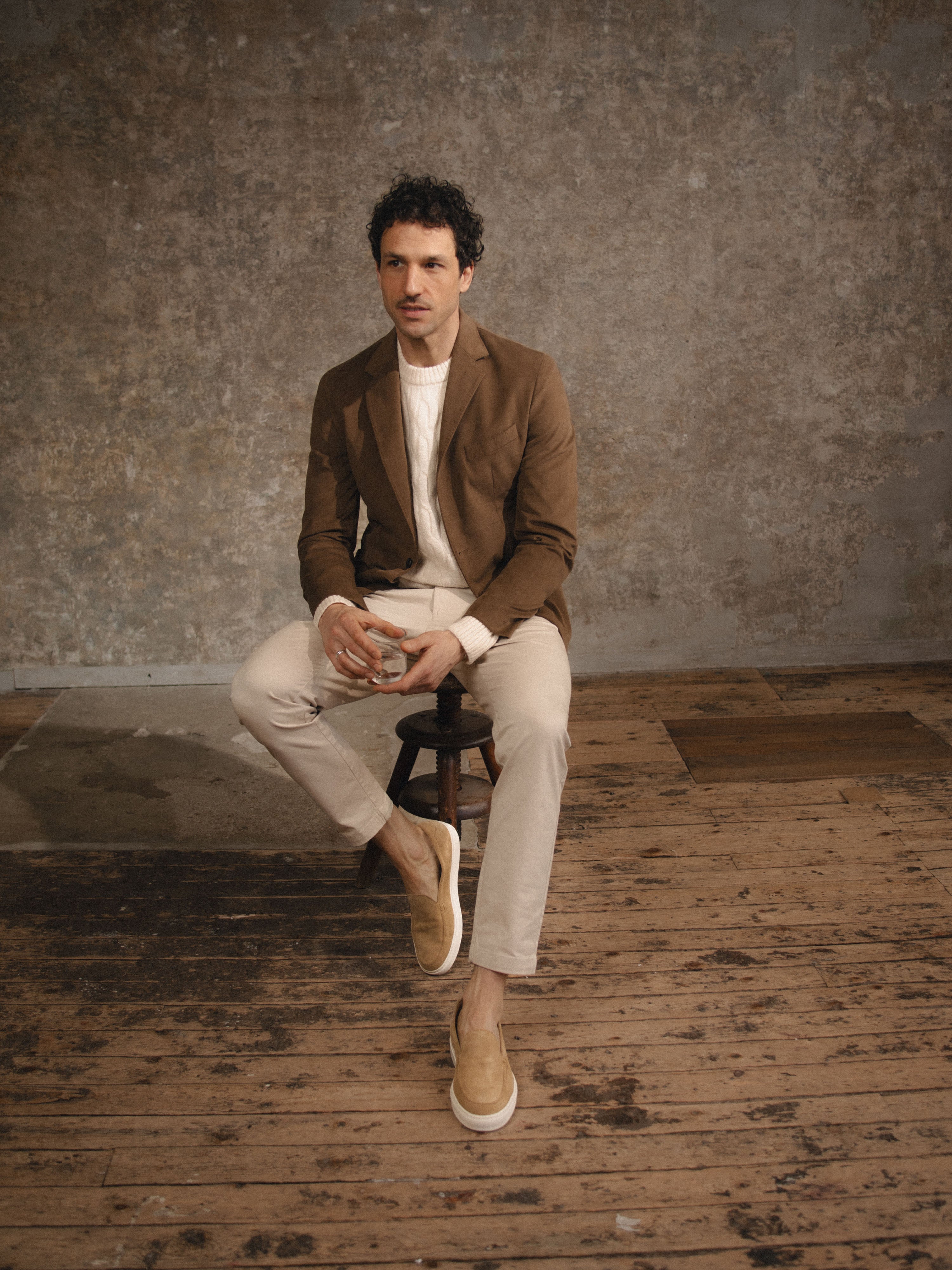 Man sitting wearing men