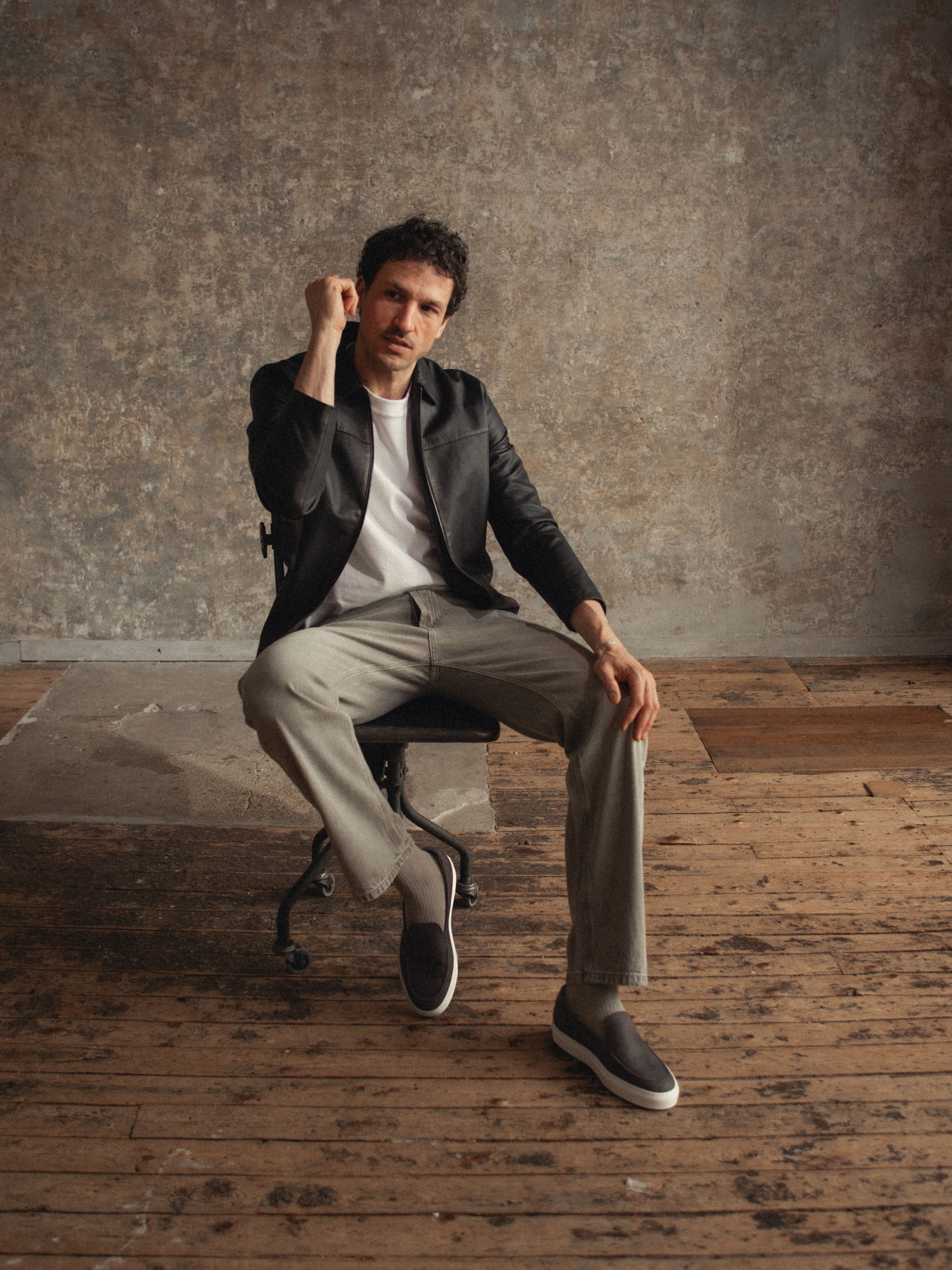 Man sitting wearing Men