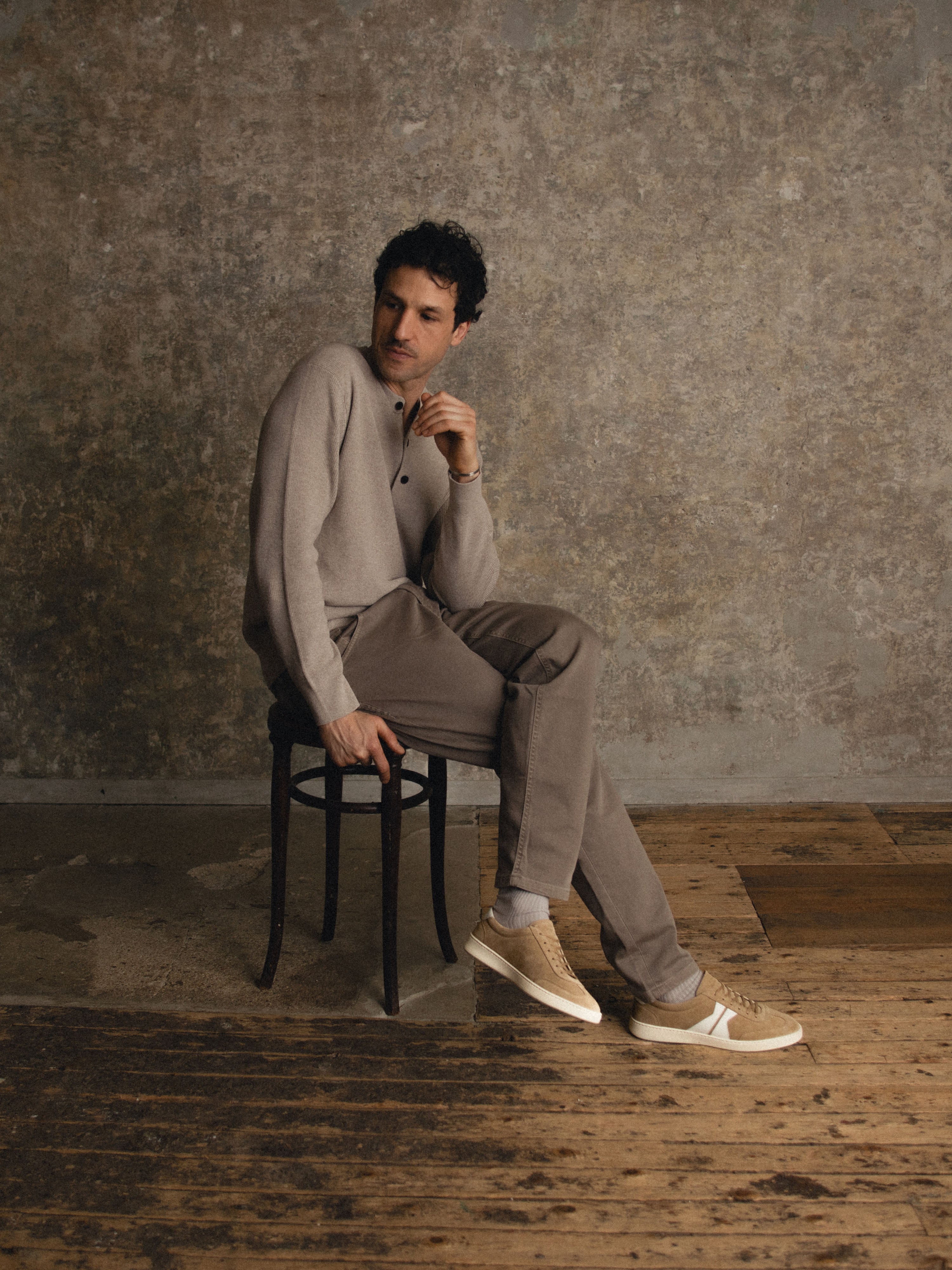 Man sitting wearing Mens